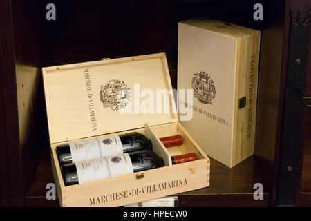 Red wine in a wooden box on sale at  wine shop Sella & Mosca's vinery built in 1903 near Alghero, Sassari, Sardinia Italy Stock Photo