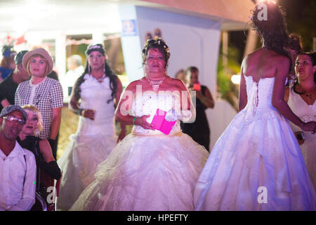 Transgender wedding guests dressed as brides from TransCuba community watching the wedding ceremony of Malu Cano, Cuban transgender woman and a transg Stock Photo