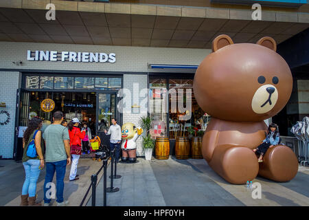 SHENZEN, CHINA - 29 JANUARY, 2017: Entrance to pastry shop with beautiful display of cakes and cookies in animal shapes. Stock Photo