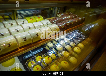 SHENZEN, CHINA - 29 JANUARY, 2017: Inside pastry shop with beautiful display of cakes and cookies in animal shapes. Stock Photo