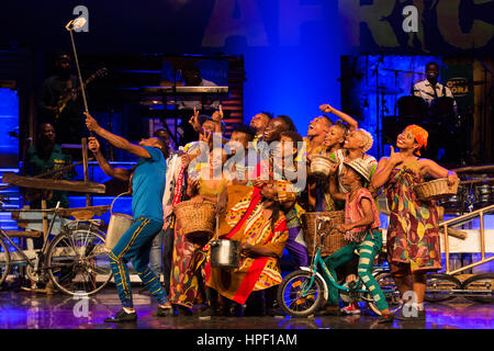 London, UK. 20 February 2017. The company takes a selfie on stage during the show. Circus company Circus of the Senses visits London from 21 February to 11 March 2017 to take audiences on a journey of discovery into Africa’s colourful world with Mother Africa: Khayelitsha – My Home. Featuring acrobats, dancers, singers and musicians from seven African nations, the group blends circus feats, colourful costumes, singing, infectious rhythms and dance to bring the pulse of daily life in the South African township of Khayelitsha to the Peacock Theatre in London's West End. Stock Photo