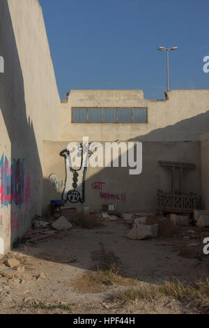 Graffiti art on an old ruined building in Kuwait city, Kuwait. Stock Photo