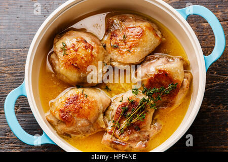 Roast chicken stew in cast iron pan close-up Stock Photo