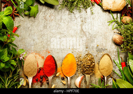 Herbs and spices selection on rustic background - cooking, gardening or vegetarian concept Stock Photo