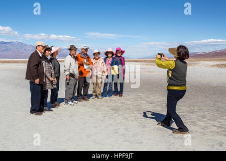 Korean-Americans, people, tourists, visitors, visiting, Badwater Basin, 282 feet below sea level, Death Valley National Park, Death Valley, California Stock Photo