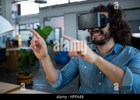 Graphic designer using the virtual reality headset in creative office Stock Photo