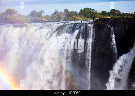 Tourists in Devil's Pool, Victoria Falls, Zambia Stock Photo