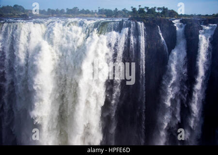 Tourists in Devil's Pool, Victoria Falls, Zambia Stock Photo