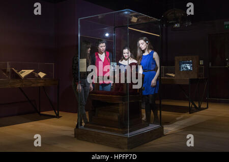 London, UK. 22nd Feb, 2017. Gallery assistants look at an Electrotherapeutic Chair, 1890-1900. The exhibition Electricity: The Spark of Life opens at the Wellcome Collection in Euston and runs until 25 June 2017. The exhibition is a collaboration between Wellcome Collection (London), the Museum of Science and Industry (Manchester) and Teylers Museum (Haarlem) and will be presented as a touring exhibition at each of these venues Credit: Bettina Strenske/Alamy Live News Stock Photo