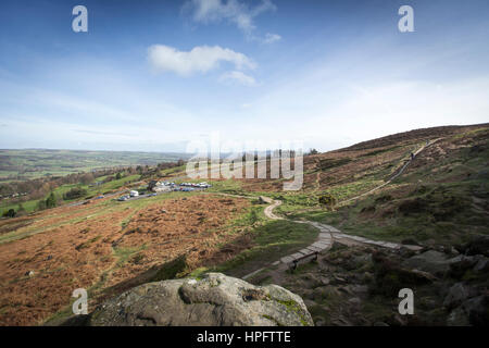 Ilkley, Yorkshire, UK. 22nd Feb, 2017. UK Weather. Sunshine and strong winds on Ilkley Moor, Yorkshire near the famous Cow and Calf rocks as the UK prepares for stormdoris Credit: Windmill Images/Alamy Live News Stock Photo