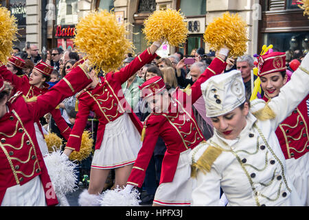 Belgrade, Serbia. 22nd Feb, 2017.  Majorettes and musicians from Herceg Novi (Montenegro) take part in the parade in the city center in Knez Mihailova Street in honor of the feast that celebrates the flowering of mimosa on the Adriatic coast which marks the end of winter and the beginning of spring season. Credit: Bratislav Stefanovic/Alamy Live News Stock Photo