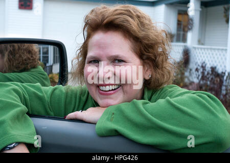 My beautiful niece Kathy having an animated conversation with us through the truck window. Downers Grove Illinois IL USA Stock Photo