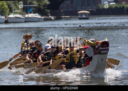 Dragonboat racers at Ping Tom Memorial Park in Chicago. Stock Photo
