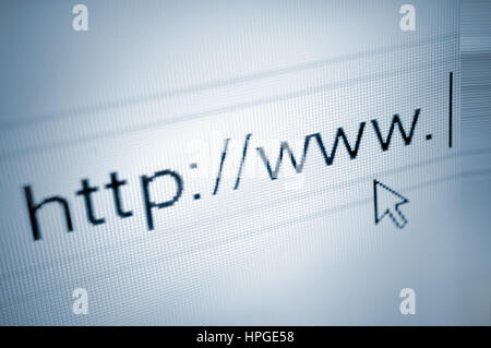 Cursor pointing at http www text in browser address bar web url link, blue browsing page arrow pointer screenshot, large detailed horizontal closeup Stock Photo