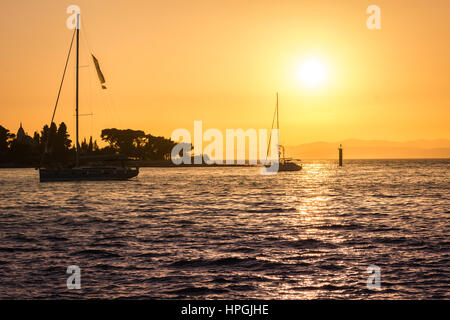 Sailing during sunset time in Croatia. Stock Photo