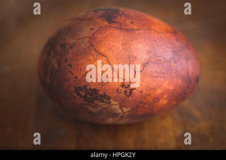 A closeup shot of decorated brown painted shapes with a pattern on a ...