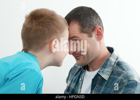 Happy father and son playing and laughing together at home. Family concept Stock Photo