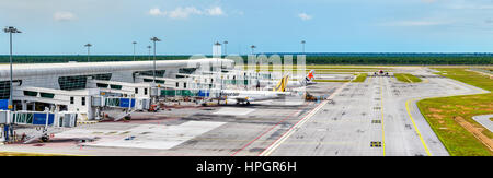 Airplanes at the terminal of Kuala Lumpur International Airport. KLIA is the largest and busiest airport in Malaysia. Stock Photo