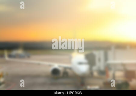 Aircraft in airport out of focus - defocused background Stock Photo