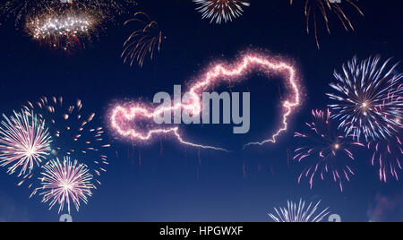 A dark night sky with a sparkling red firecracker in the shape of Austria composed into.(series) Stock Photo