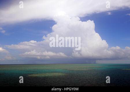 Small storm over Great Barrier Reef disrupts coral bleaching weather during summer, Queensland, Australia Stock Photo