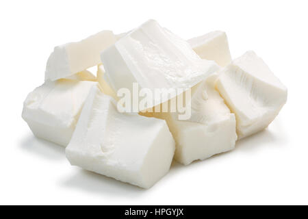 Pile of roughly chopped soft brined Feta cheese. Clipping paths, shadow separated Stock Photo