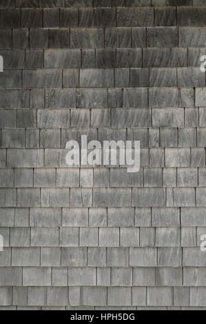 Neat. tidy. newer grey cedar shakes shingles background Stock Photo