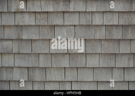 Neat. tidy. newer grey cedar shakes shingles background Stock Photo