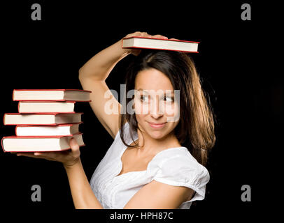 Junge Frau mit Buchstapel - woman with stack of books, Model released