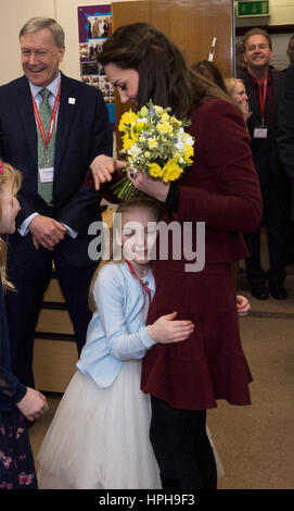 The Duchess of Cambridge gets a hug from Ypapanti Galimatakis-Rees during a visit to MIST, a child and adolescent mental health project in Torfaen in Wales. Stock Photo