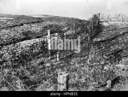 The Nazi propaganda image shows entangled barbed wire fencing erected to protect German Wehrmacht bunker areas on the Atlantic Wall. Published in April 1944. Fotoarchiv für Zeitgeschichte - NO WIRE SERVICE - | usage worldwide Stock Photo