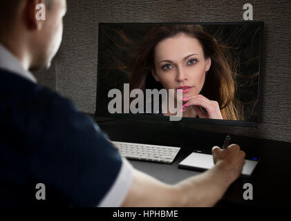 retoucher at work. man edits photo on a computer monitor Stock Photo