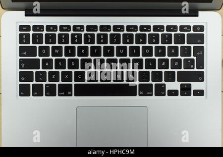 aluminum laptop with a nice design on the  Danish keyboard Stock Photo