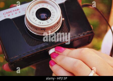 Analog camera in expressive colours. Stock Photo