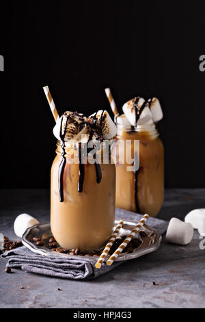 Iced coffee with toasted marshmallow and chocolate syrup Stock Photo