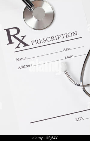 Medical ideas - prescription form with stethoscope over it Stock Photo