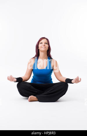 Model released , Frau im Jogasitz - woman does yoga Stock Photo