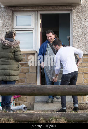 Belongings are removed from the home of EuroMillions draw winner and mother of four Beverley Doran, 37, from Shipley, West Yorkshire, who scooped a &pound;14,509,500 jackpot prize on last Friday's (17 Feb 2017) EuroMillions draw. Stock Photo