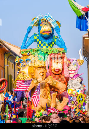 Cento, Italy, 19 feb 2017: Carnival of Cento, a satirical parade float shows Donald Trump as Tarzan between monkeys Stock Photo