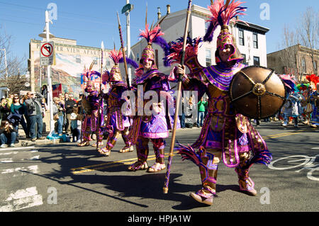 Onlookers watch the Mardi Gras Mummer's Parade march by on Manayunk's Main Street in Northwest Philadelphia, PA, on Feb. 18, 2017 Stock Photo