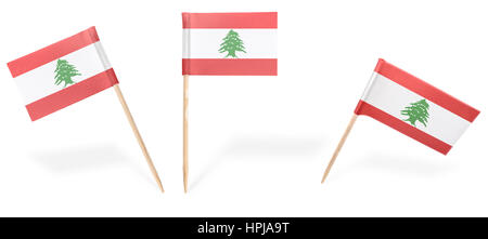 Small cocktail flags of Lebanon in different positions isolated on white.(series) . Also easy to use as a design element :) Stock Photo