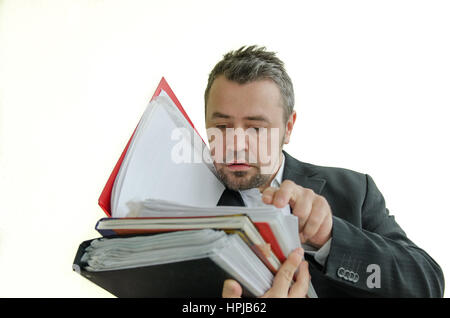 focused, serious businessman with folders in hand Stock Photo