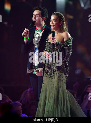 Nick Grimshaw and Rita Ora on stage at the Brit Awards at the O2 Arena, London. Stock Photo