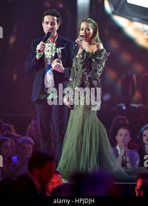 Nick Grimshaw and Rita Ora on stage at the Brit Awards at the O2 Arena, London. Stock Photo