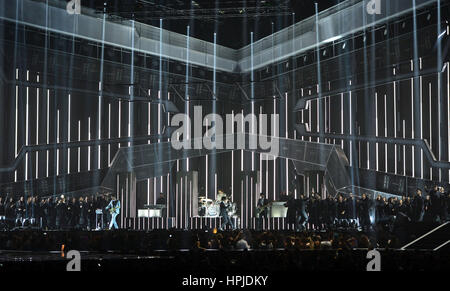 The 1975's Matthew Healy, Adam Hann, George Daniel and Ross MacDonald performing on stage at the Brit Awards at the O2 Arena, London. Stock Photo