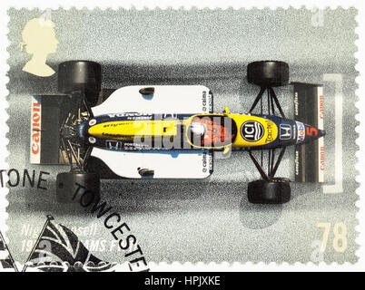 UNITED KINGDOM - CIRCA 2007: A used postage stamp printed in Britain celebrating the 50th Anniversary of the British Grand Prix showing Nigel Mansell  Stock Photo