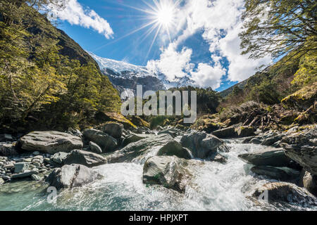 Glacial river flowing through mountains, Rob Roy Glacier, Mount Aspiring National Park, Otago, Southland, New Zealand