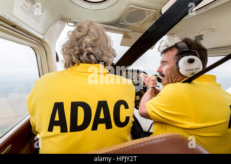 ADAC traffic jam observers in small aircraft in flight, Landshut, Bavaria, Germany Stock Photo