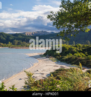 Abel Tasman National Park, Tasman, New Zealand. View over Sandy Bay from the Abel Tasman Coast Track near Marahau. Stock Photo