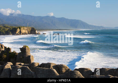 Punakaiki, Paparoa National Park, West Coast, New Zealand. View over Pancake Rocks and the wave-battered Tasman Sea coast from Dolomite Point. Stock Photo